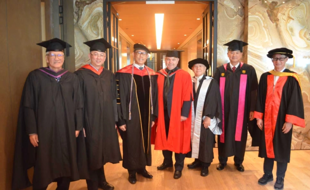 Dr. Alan Go — graduation ceremony in academic robes